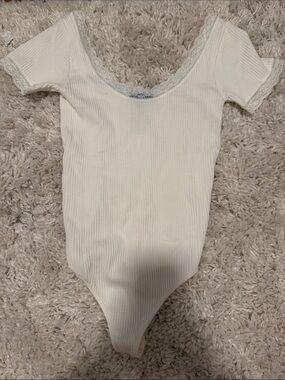 Francesca’s Lacy White Bodysuit